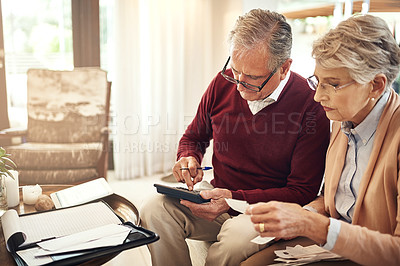 Buy stock photo Finance, calculator and budget with an old couple in their home for retirement or pension planning. Debt bills, money or investment with a senior man and woman in their house for financial insurance