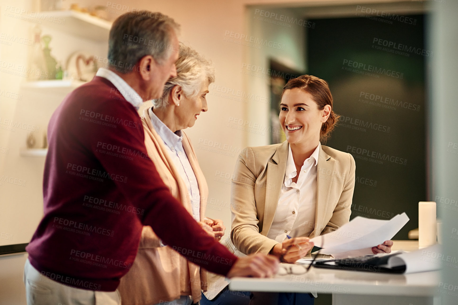 Buy stock photo Senior couple, lawyer and documents in discussion for budget or retirement plan at home. Happy elderly man and woman with consultant or financial advisor and paperwork for investment planning or loan
