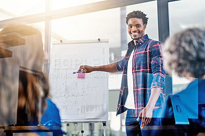 Buy stock photo Business meeting, presentation and happy black man with team in office for growth, development and sale target. Speaker, black man and leader with whiteboard and people for planning, goal or strategy