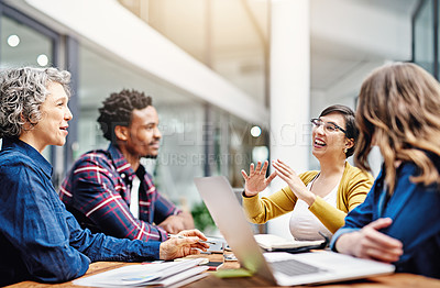 Buy stock photo Cropped shot of a group of creatives having a meeting in a modern office