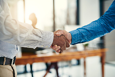 Buy stock photo Closeup shot of businesspeople shaking hands in an office