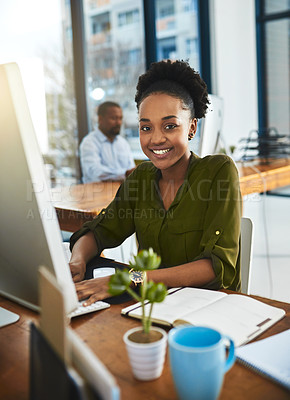 Buy stock photo Cropped portrait of a businesswoman working on her computer in the office