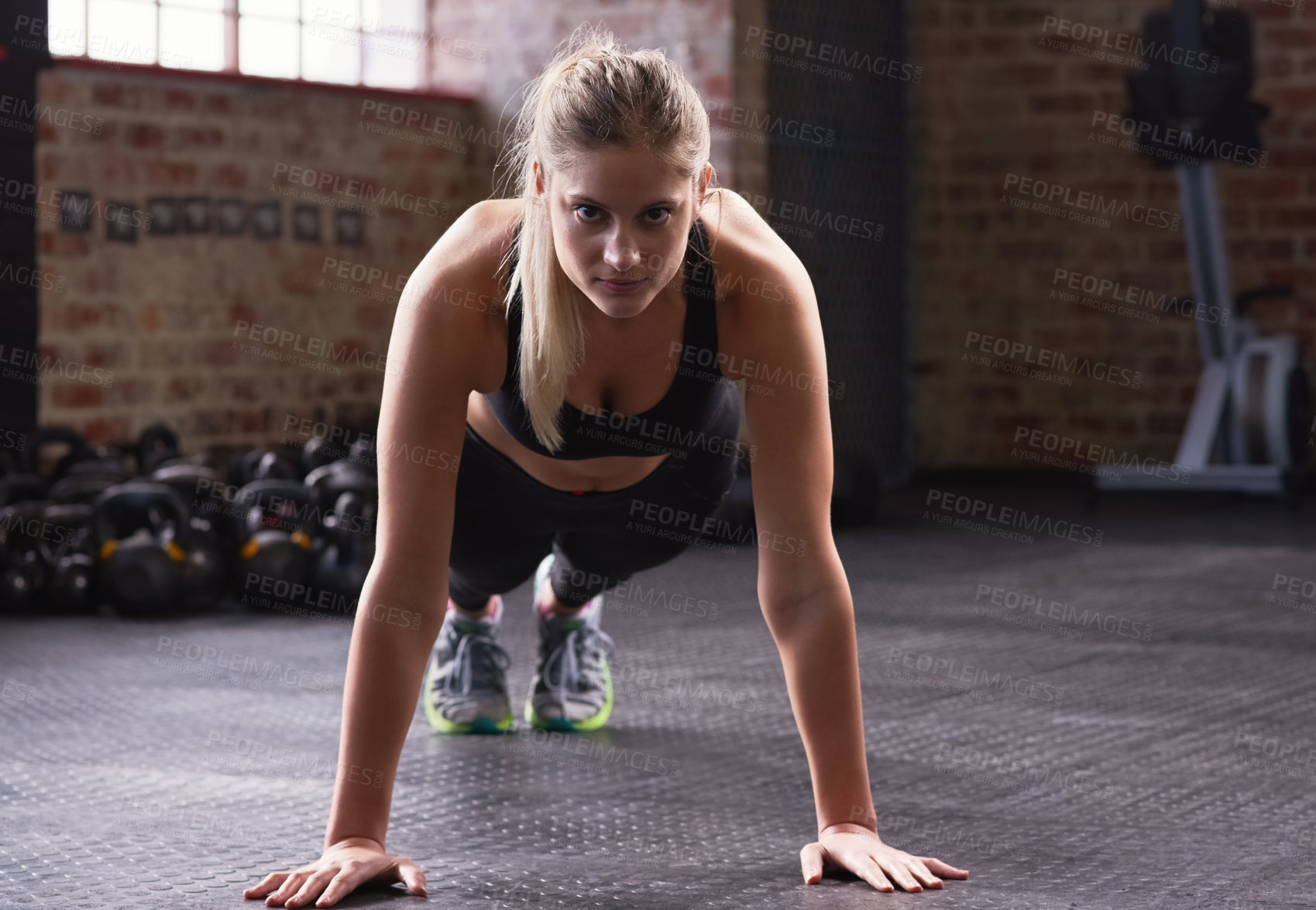 Buy stock photo Fitness, plank and woman in portrait in gym for workout, training and strength for core muscle. Female athlete, physical activity and exercise with balance, endurance and commitment in sports