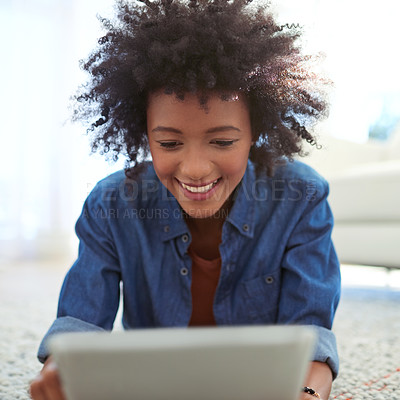 Buy stock photo Happy, black woman and tablet on floor at home to relax by  browsing or surfing social media or online from internet. Smile, African and female person with digital tech on break for entertainment