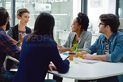 Buy stock photo Shot of a group of creative businesspeople meeting in the boardroom