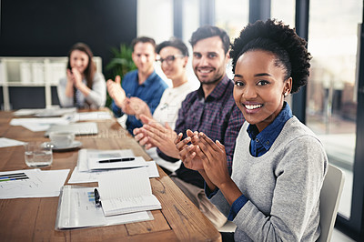 Buy stock photo Cropped portrait of a group of colleagues applauding during a presentation