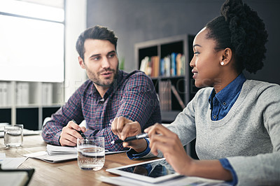 Buy stock photo Business people, meeting and discussion by desk in office for proposal, teamwork and planning. Man, woman and tablet with documents on table for financial report, communication and investment review