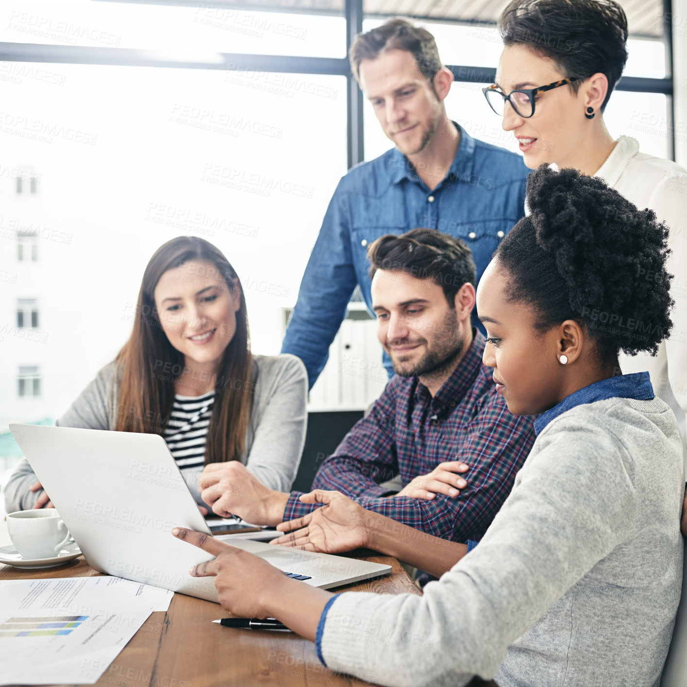 Buy stock photo Cropped shot of a group of businesspeople meeting in the boardroom