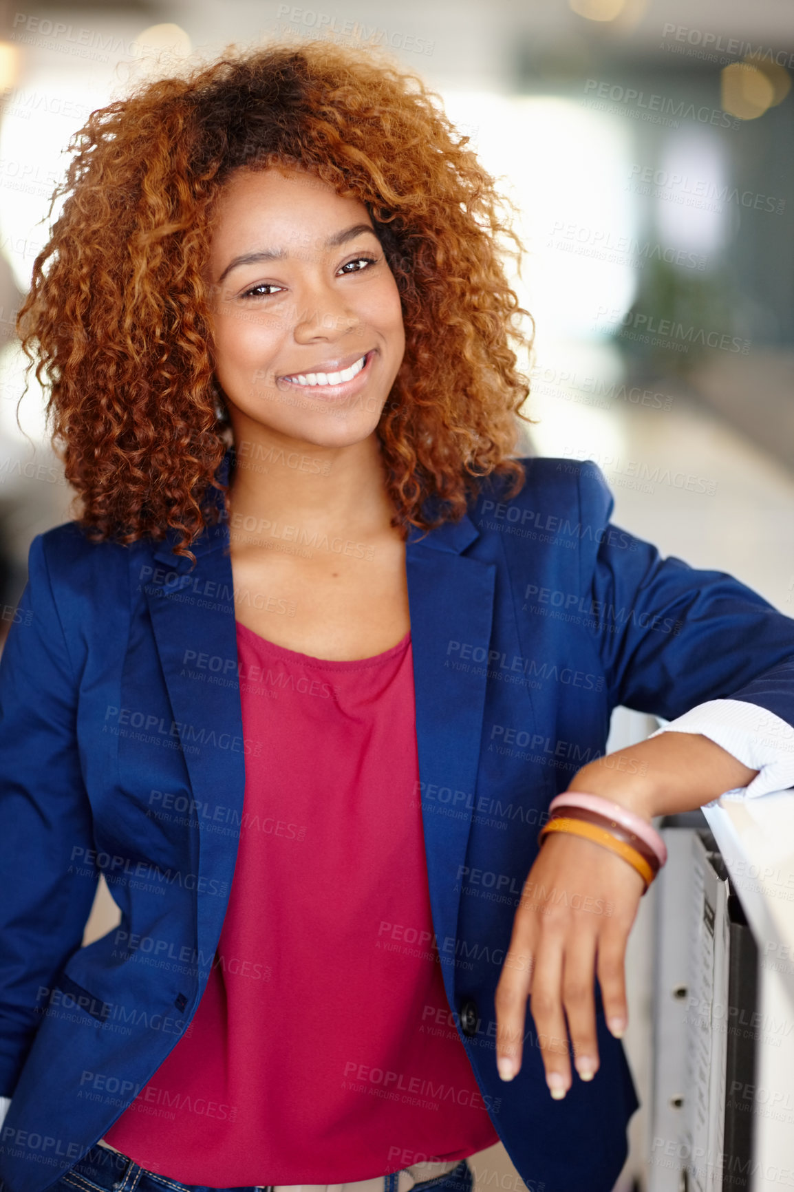 Buy stock photo Portrait of a confident young businesswoman standing in an office