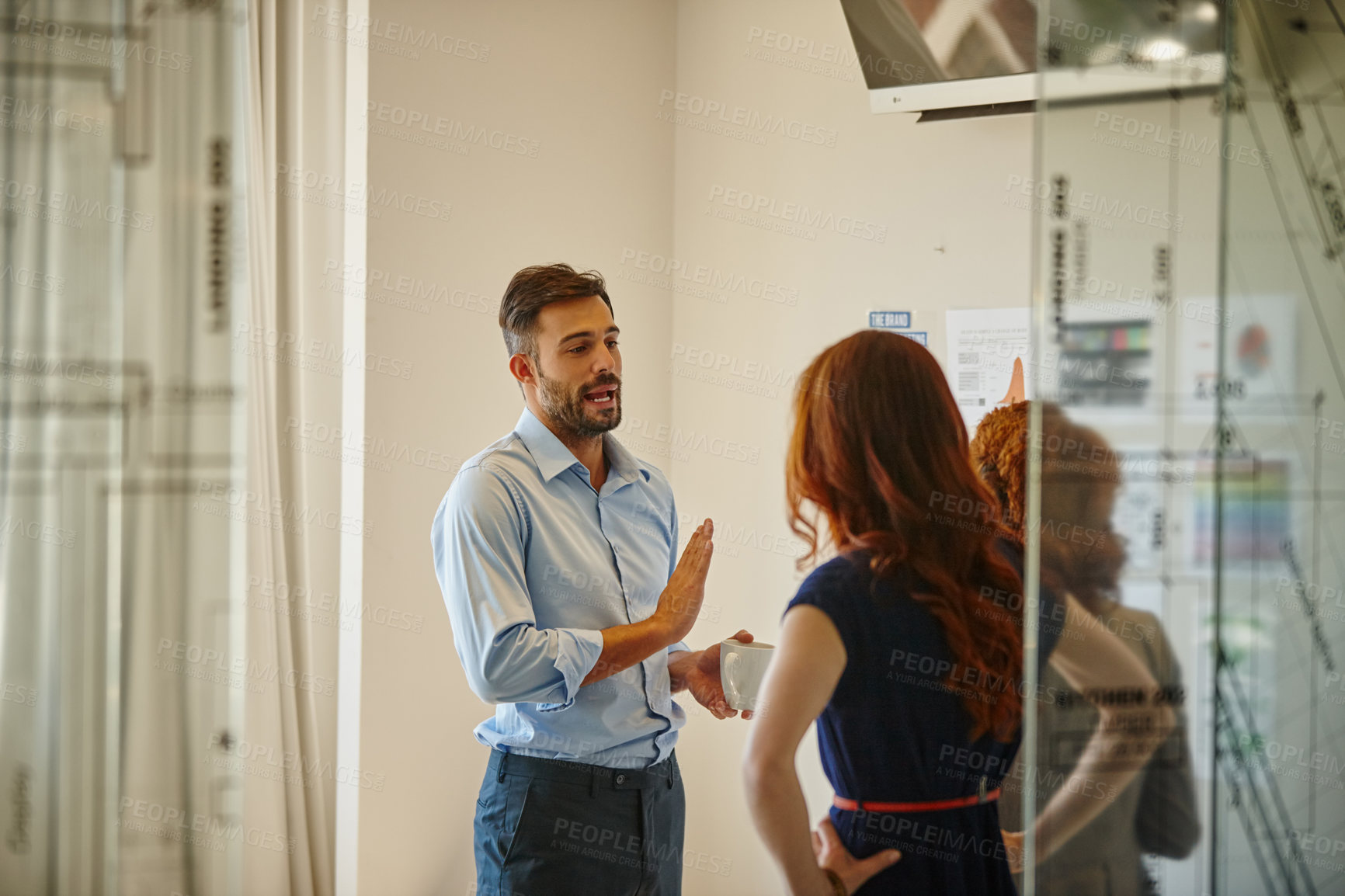 Buy stock photo Shot of a group of colleagues having a brainstorming session at work