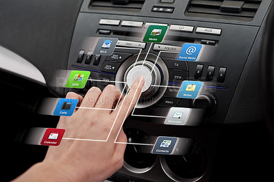 Buy stock photo Closeup shot of a driver accessing digital applications inside a motor vehicle