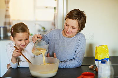 Buy stock photo Kitchen, mother and girl learning to bake in home for cookies, dessert and bonding together. Happy family, mom and daughter for cooking with ingredients, recipe and teaching for cake in house