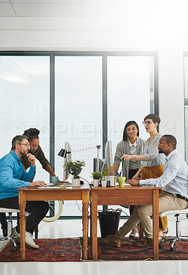 Buy stock photo Full length shot of a group of colleagues working in their office
