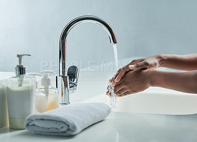 Buy stock photo Home, washing hands and person in bathroom for skincare, wellness and hygiene in morning. Healthcare, beauty and arms with liquid, soap and splash for cleaning, hydration and cleansing skin in home