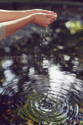 Buy stock photo Outdoor, woman and hands with water, cleaning and sunshine with spring, prevent germs and remove dirt. Closeup, river and person with splash, environment and habit for bacteria, ecology and forest