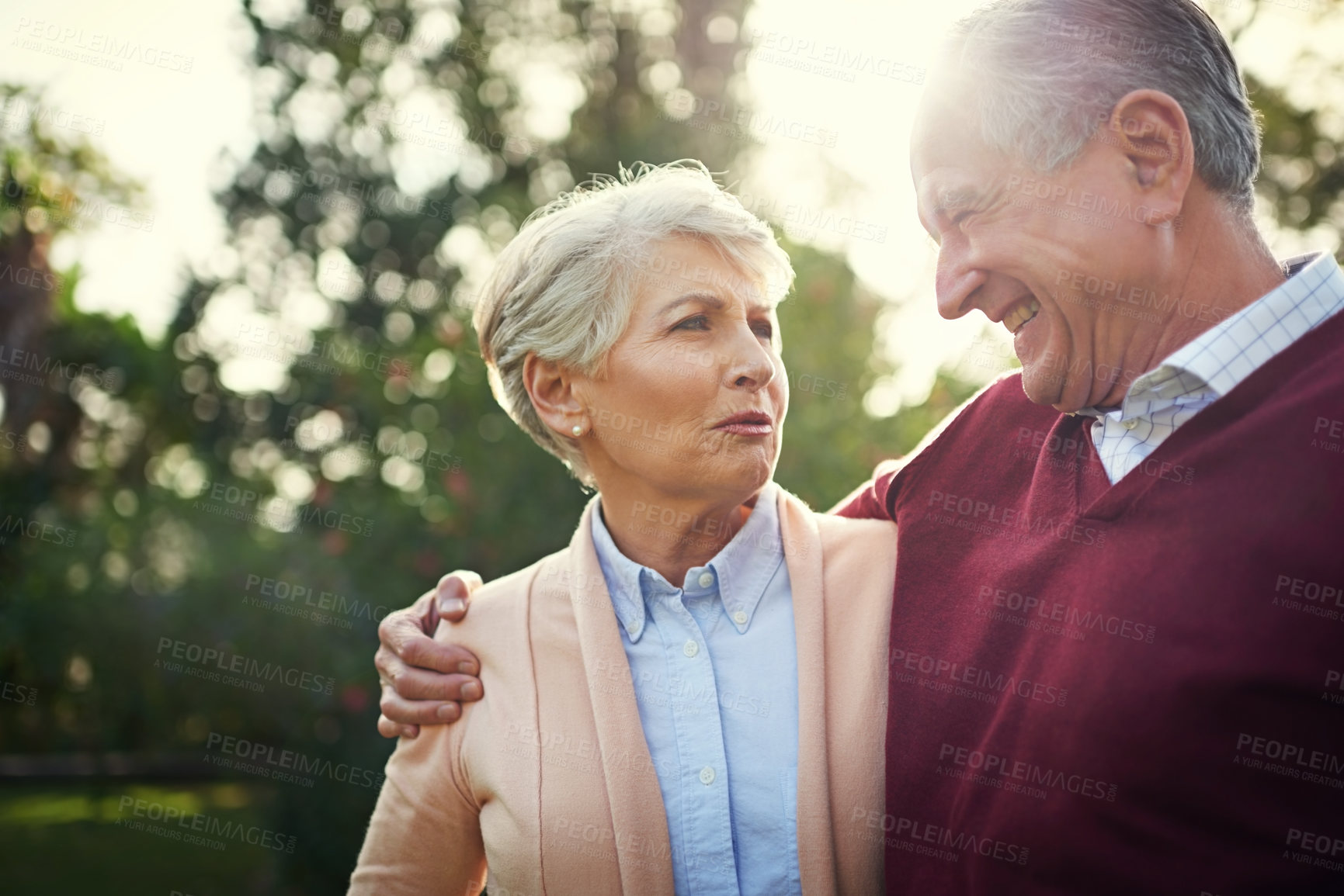 Buy stock photo Happy, senior couple and hug with laughter at funny joke for bonding, garden walk and commitment to partner. Retirement, man and woman with love embrace, comedy and relax in backyard for marriage