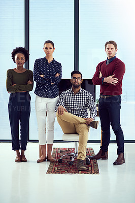 Buy stock photo Portrait of a group young designers at a work station in front of a window