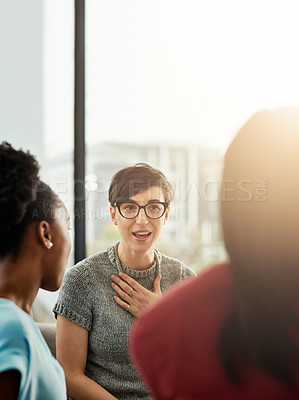 Buy stock photo Shot of businesswomen having a conversation in the office