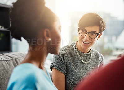 Buy stock photo Shot of businesswomen having a conversation in the office