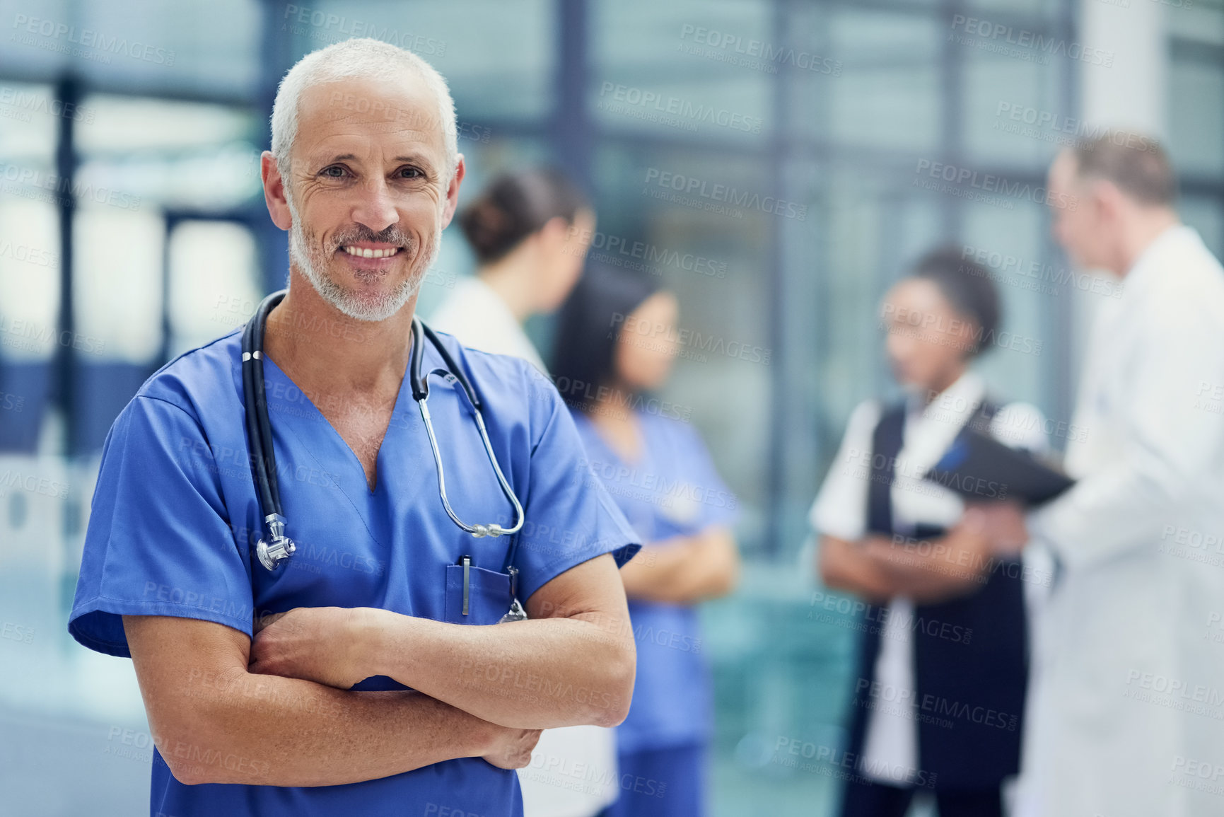 Buy stock photo Portrait of senior doctor or nurse with mockup, smile and happiness in hospital, confidence in medical career. Health care, confident help and medicine, happy man or nursing professional in workplace