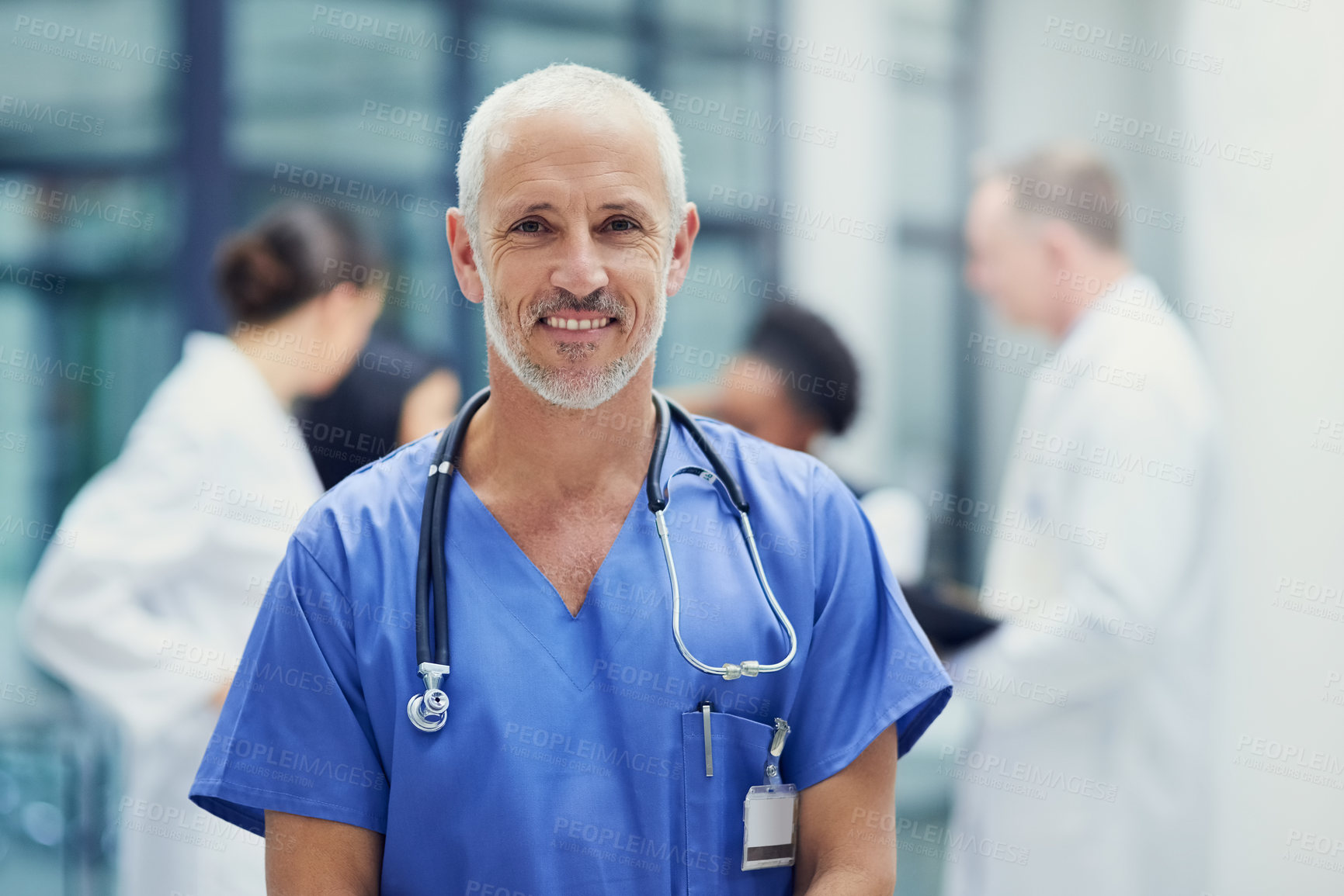 Buy stock photo Healthcare, portrait of doctor or nurse with smile in hospital, happiness and support in medical career. Health care, confidence and medicine, happy man or senior nursing professional in workplace.