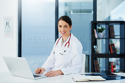 Buy stock photo Doctor, woman and portrait at desk with laptop, medical research and planning hospital schedule. Female person, smile and confident for healthcare, cardiologist and clinic website for expert medicare