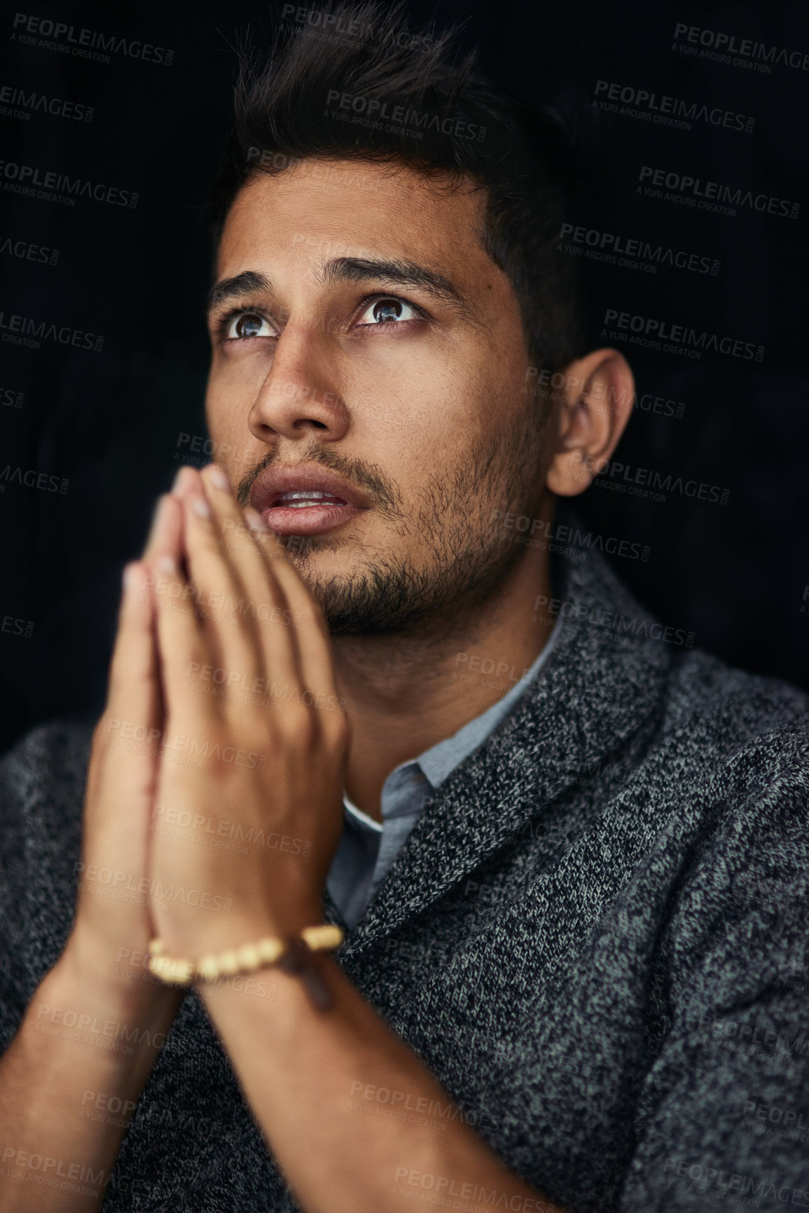 Buy stock photo Hands, sorry or man in studio praying for hope, help or guidance to worship God on black background. Fear, rosary or scared Christian guy asking for safety in prayer to Jesus for spiritual support
