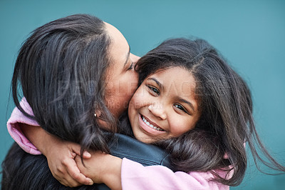 Buy stock photo Cropped portrait of a cute little girl hugging her mother