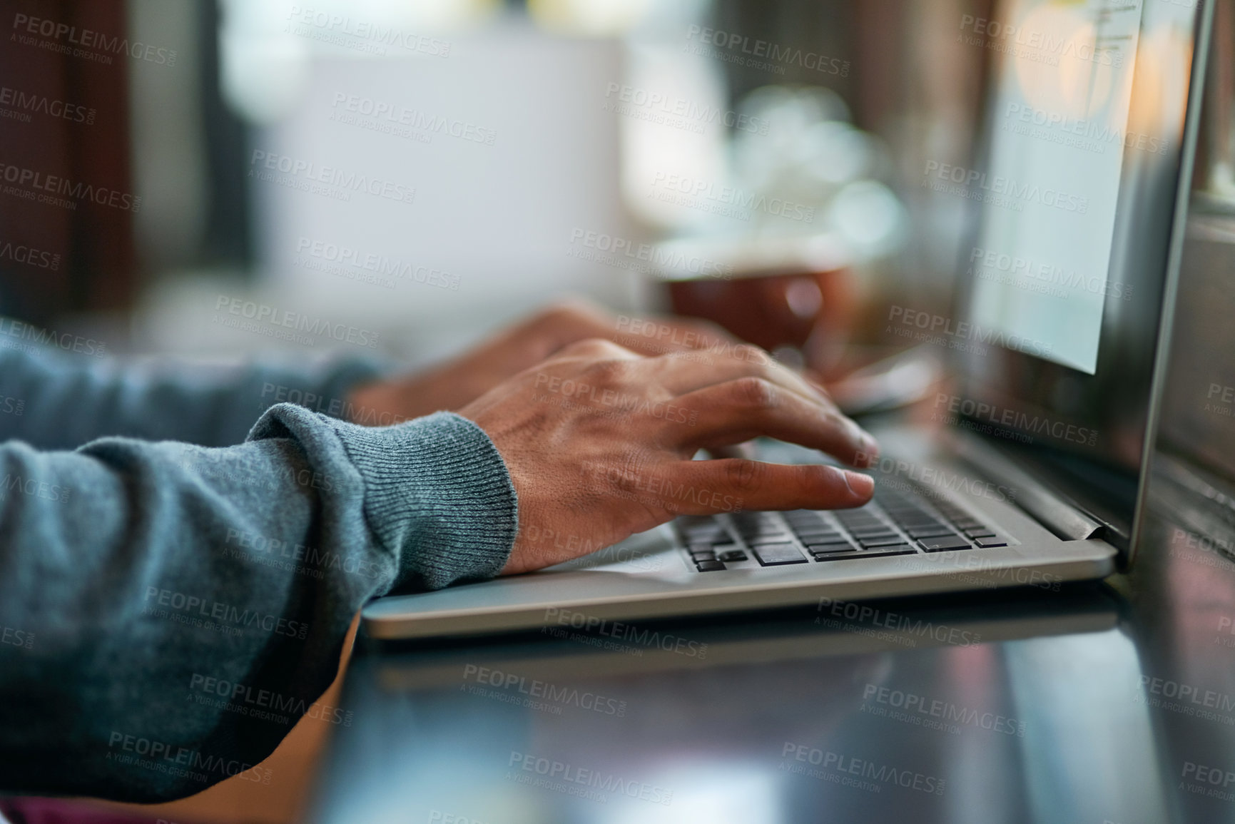 Buy stock photo Laptop, hands and man typing for working on creative web design for startup company. Technology, freelancer and male copywriting editor with computer for online research project at coffee shop.