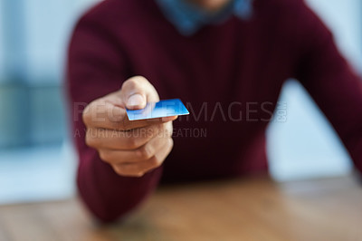 Buy stock photo Shot of an unidentifiable businessman holding out his credit card