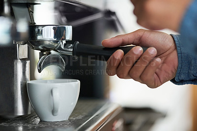 Buy stock photo Cropped shot of a barista making a cup of coffee