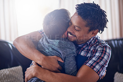Buy stock photo Cropped shot of a father and son spending some quality time together at home