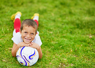 Buy stock photo Portrait of a young boy playing soccer outside