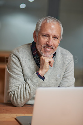 Buy stock photo Laptop, businessman and portrait in workplace with smile, pride and working at night for project. Happy, corporate and senior male person in workplace for online, email and commitment to company