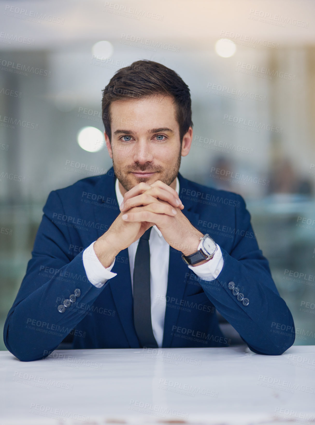 Buy stock photo Portrait of a young businessman sitting in his office