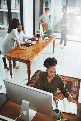 Buy stock photo Cropped shot of a group of creatives working in a modern office