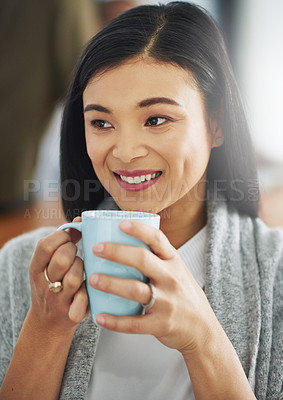 Buy stock photo Shot of a young businesswoman enjoying a cup of coffee