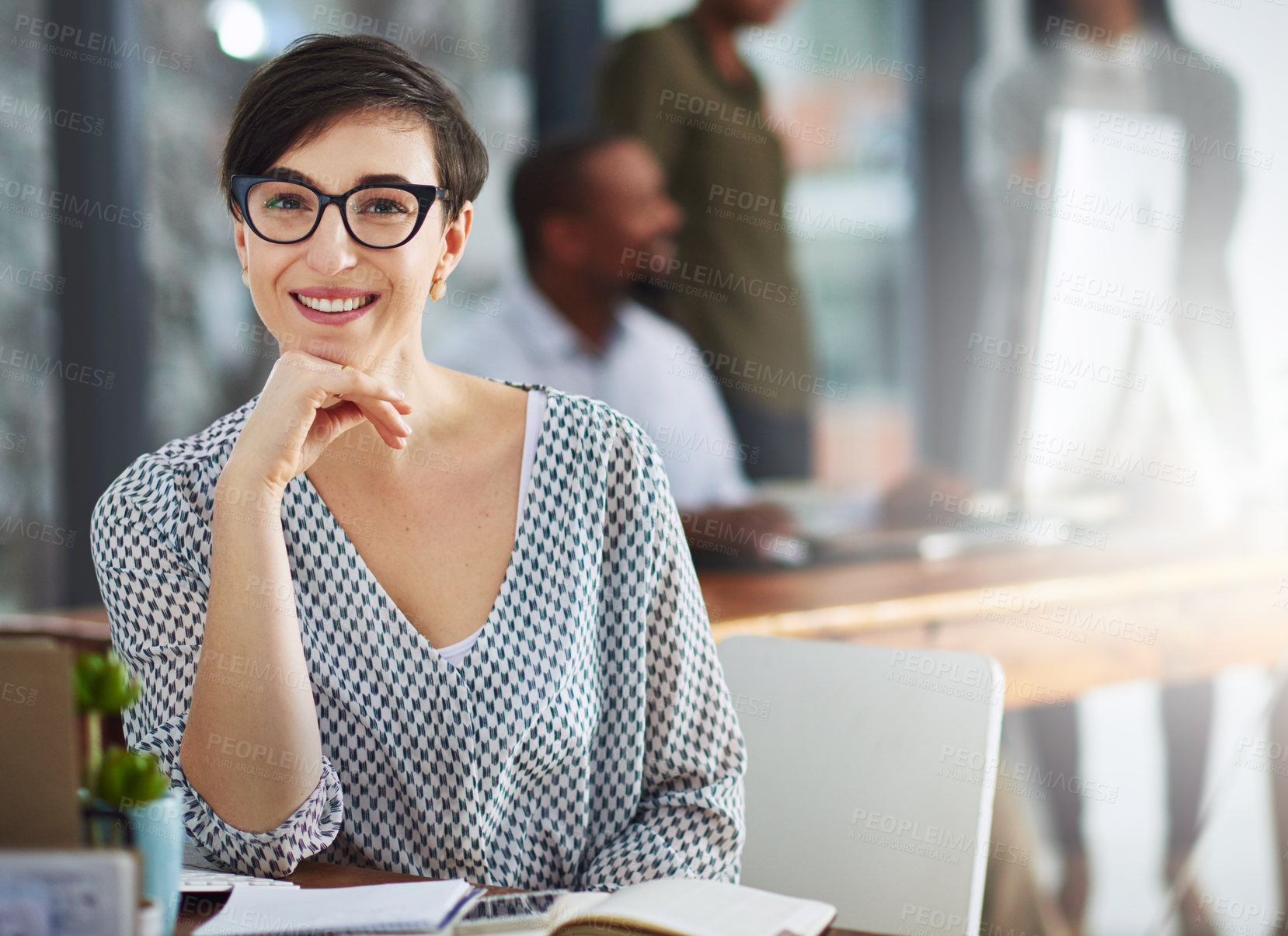 Buy stock photo Glasses, notebook and portrait of businesswoman in office with confidence and positive attitude for creative career. Smile, pride and female director planning gallery curation by desk in workplace.