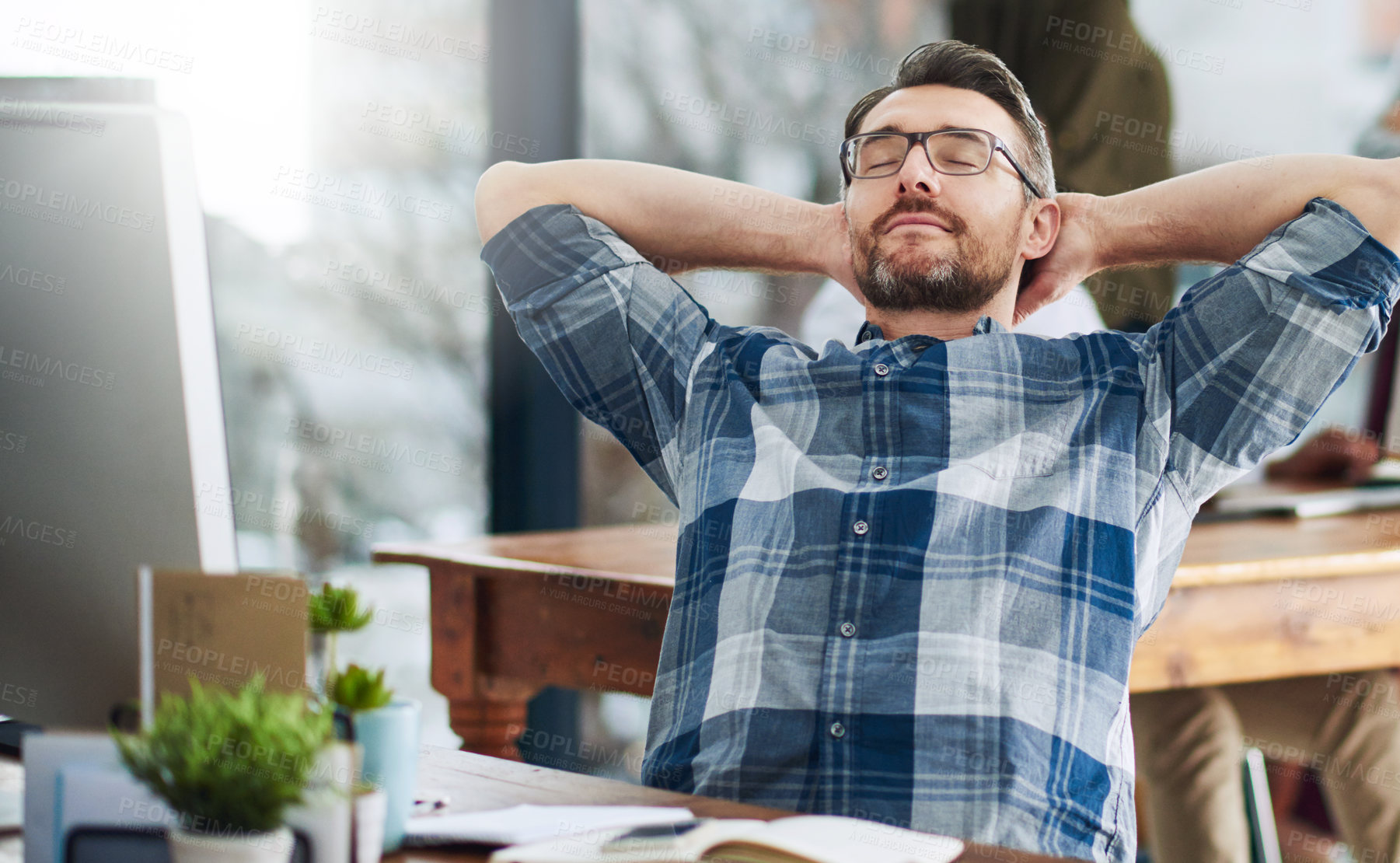 Buy stock photo Cropped shot of a mature businessman taking a break at his desk