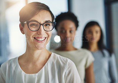 Buy stock photo Smiling and happy modern business woman looking proud of her success and team. Portrait of a female office worker with a smile enjoying her job. Successful colleague ready for a work collaboration
