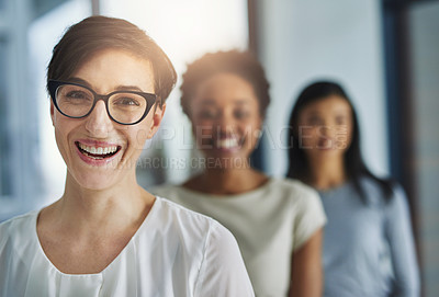 Buy stock photo Happy, professional business woman and hiring team welcoming new recruits and employees to the office. Portrait of female leader and HR manager smiling with diverse colleagues in background.