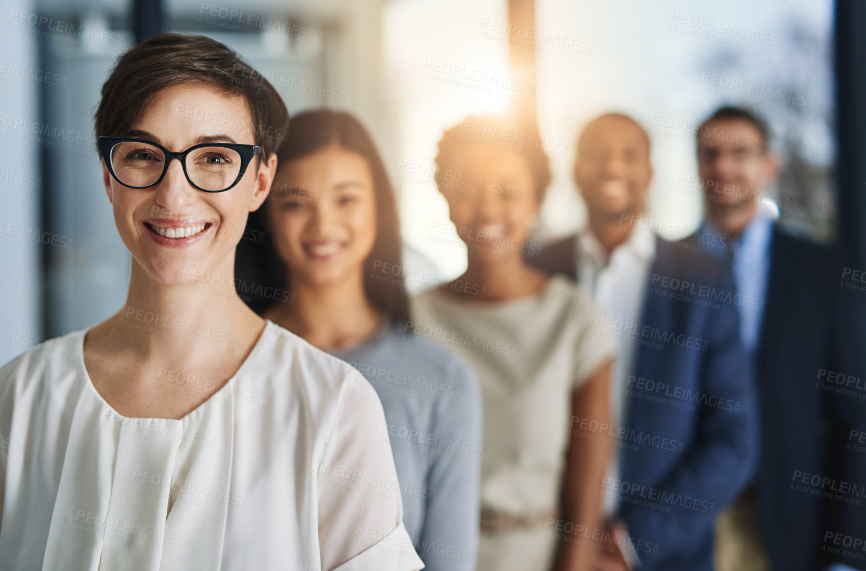 Buy stock photo Smile, business and portrait or woman with team in office for leadership, teamwork and career goals together. Diverse, people and glasses with pride, collaboration and support of startup company
