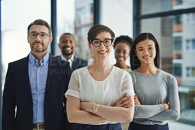Buy stock photo A proud, confident and diverse team of lawyers standing in an office or a law firm. Portrait of a happy and smiling group of advocates or legal employees in unity, teamwork and collaboration