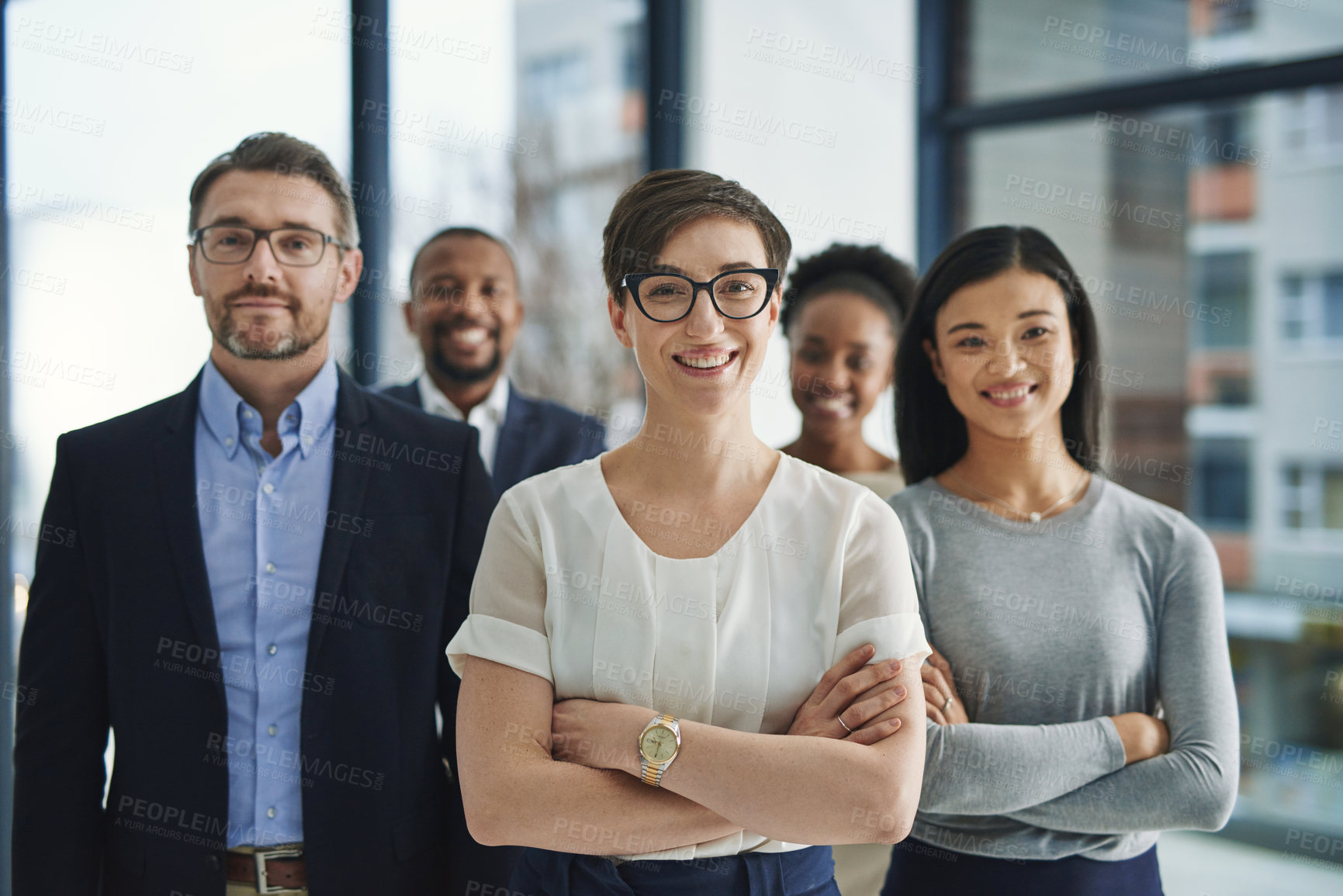 Buy stock photo A proud, confident and diverse team of lawyers standing in an office or a law firm. Portrait of a happy and smiling group of advocates or legal employees in unity, teamwork and collaboration