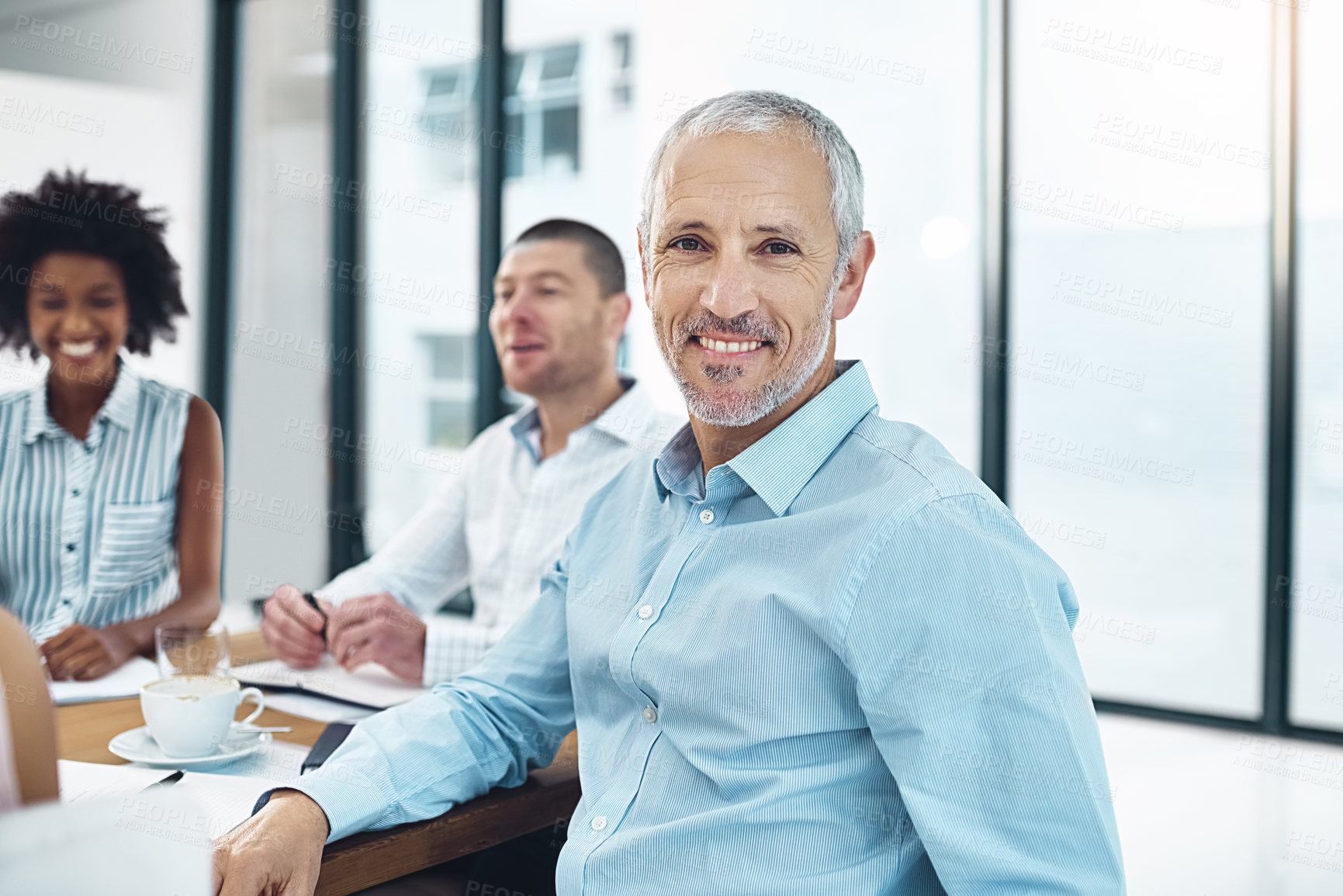 Buy stock photo Portrait, businessman and smile at meeting, boardroom and colleagues for mature man, office and workshop. Collaboration, training and documents on leader, productivity and professional company team