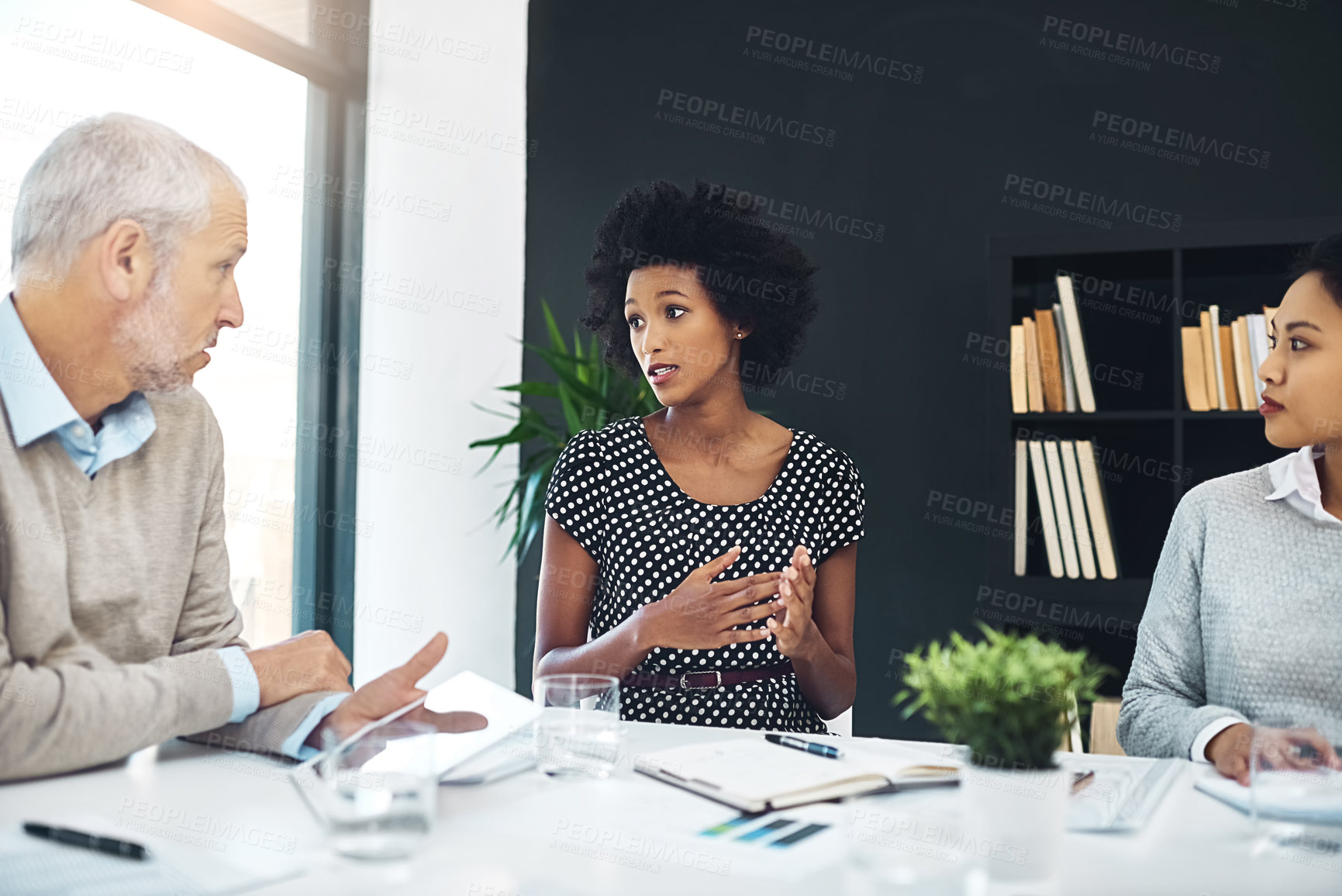 Buy stock photo Group, collaboration and meeting for company with mature man, discussion and tablet. Team, diversity and ideas in brainstorming with startup in boardroom at office for business as colleagues