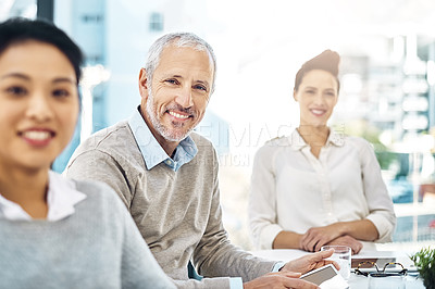 Buy stock photo Creative, meeting and portrait of people in project management with proposal, report or planning. Teamwork, collaboration and mature businessman with review, advice in workshop or feedback in office