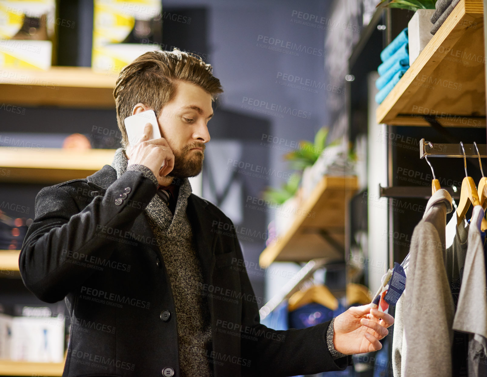 Buy stock photo Businessman, phone call and shopping in boutique for retail, fashion and clothes in shop for sale. Male person, communication and customer in store for networking and mobile for thrifting advice 