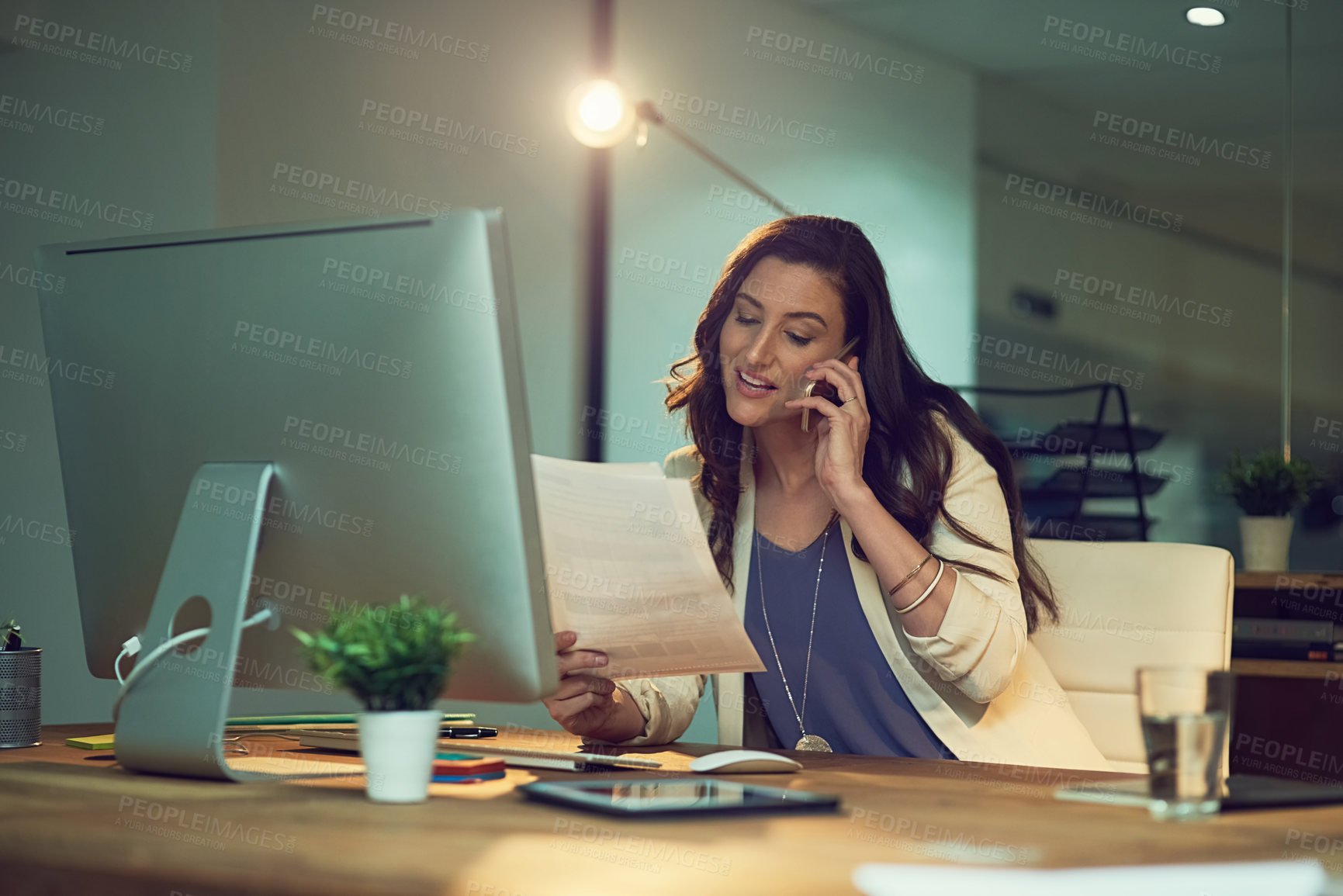 Buy stock photo Cropped shot of a young businesswoman working late in an office