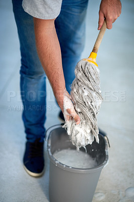 Buy stock photo Person, hand and mopping bucket for cleaning with soap as janitor service for health, bacteria or maintenance. Washing, tools and germs equipment for dirty floor or fluid chemical, house or sanitize